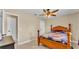 Cozy bedroom featuring tile floors and a comfortable bed at 808 Austin Cir, Bartow, FL 33830