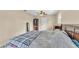 Spacious bedroom featuring neutral tones, tile flooring, and ample closet space at 808 Austin Cir, Bartow, FL 33830