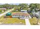 Charming single story home with a long driveway, backyard pool, and large storage shed at 808 Austin Cir, Bartow, FL 33830