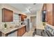 Well-equipped kitchen featuring updated appliances and granite countertops at 808 Austin Cir, Bartow, FL 33830