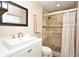 Bathroom showcasing stylish vanity, glass enclosed shower with neutral tiling and mosaic accents at 5732 Sawyer Rd, Lakeland, FL 33810