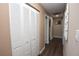 Hallway with closet space and neutral tones, providing functionality and a clean aesthetic at 5732 Sawyer Rd, Lakeland, FL 33810