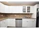 This kitchen features stainless steel appliances, granite countertops, plenty of cabinets, and ample counter space at 5732 Sawyer Rd, Lakeland, FL 33810