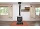 Close up of the wood-burning stove in the living room at 5732 Sawyer Rd, Lakeland, FL 33810