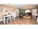 Open-concept living space connecting dining and living areas, perfect for entertaining and Gathering gatherings at 5732 Sawyer Rd, Lakeland, FL 33810