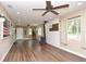 Spacious living room with a wood-burning stove and plenty of natural light at 5732 Sawyer Rd, Lakeland, FL 33810