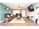 Cozy living room featuring comfortable seating, stylish decor, and a welcoming atmosphere, perfect for relaxation at 5732 Sawyer Rd, Lakeland, FL 33810