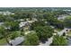 Aerial view of houses nestled among verdant trees in a peaceful neighborhood at 3813 Surrey Dr, Orlando, FL 32812