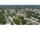 Aerial view of a tranquil residential area filled with lush trees at 3813 Surrey Dr, Orlando, FL 32812