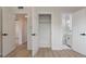 An open closet with built-in storage is shown in the home at 3813 Surrey Dr, Orlando, FL 32812