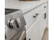 Close up of new kitchen countertop and stainless steel stove at 3813 Surrey Dr, Orlando, FL 32812