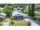 An aerial shot showcasing the home's curb appeal and charming covered parking area at 1013 Pennsylvania Ave, Lakeland, FL 33803
