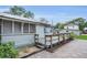 Exterior view of a backyard with a wooden deck and patio at 1013 Pennsylvania Ave, Lakeland, FL 33803