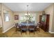 Inviting dining room featuring a stylish table setting, natural light, and classic furnishings, ideal for memorable gatherings at 1130 Ewell Rd, Lakeland, FL 33811
