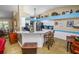 Kitchen with a breakfast bar, barstool seating, and stainless steel appliances at 1130 Ewell Rd, Lakeland, FL 33811