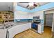 Kitchen with stainless steel oven and microwave and granite countertops at 1130 Ewell Rd, Lakeland, FL 33811