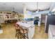 Open concept kitchen with granite countertops and breakfast bar seating at 1130 Ewell Rd, Lakeland, FL 33811