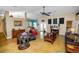 Open-concept living room with comfortable seating, stylish decor, and seamless access to the patio and pool, perfect for indoor-outdoor living at 1130 Ewell Rd, Lakeland, FL 33811