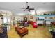 Spacious living room with modern decor, comfortable seating, and an open floor plan, creating an inviting and stylish atmosphere at 1130 Ewell Rd, Lakeland, FL 33811