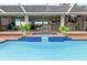 Inviting pool with a spa and outdoor entertaining area, perfect for relaxation and gatherings at 1130 Ewell Rd, Lakeland, FL 33811