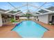 A beautiful in-ground pool with a spa, perfect for hot summer days and entertaining guests at 1130 Ewell Rd, Lakeland, FL 33811