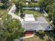 An aerial view showcases this beautiful home and surrounding greenery at 1195 S 1St Ave, Bartow, FL 33830