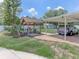 Backyard featuring an outdoor kitchen and covered parking at 1195 S 1St Ave, Bartow, FL 33830
