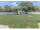 Spacious backyard featuring a storage shed and well-maintained lawn at 1195 S 1St Ave, Bartow, FL 33830