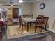 The dining room featuring a beautiful wood table and stylish overhead ceiling fan at 1195 S 1St Ave, Bartow, FL 33830