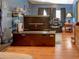Relaxing living room featuring a large television, comfortable furniture, and natural light at 1195 S 1St Ave, Bartow, FL 33830