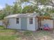An exterior view of the property's outbuilding with covered seating area at 1195 S 1St Ave, Bartow, FL 33830