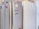 Stainless steel refrigerator adorned with various magnets and decorations at 1195 S 1St Ave, Bartow, FL 33830