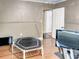 A spacious room featuring an indoor trampoline, glossy hardwood floors and neutral paint at 1195 S 1St Ave, Bartow, FL 33830