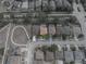 Aerial view of the house and its surrounding neighborhood at 143 Alfani St, Davenport, FL 33896