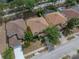 An aerial view showcases this property with its well-maintained yard and nearby neighborhood amenities at 143 Alfani St, Davenport, FL 33896