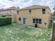 Backyard view of the home at 143 Alfani St, Davenport, FL 33896
