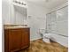 Bright bathroom featuring tile floors, vanity and shower with glass doors at 143 Alfani St, Davenport, FL 33896
