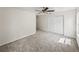 Bedroom with carpeting, large closet, and ceiling fan at 143 Alfani St, Davenport, FL 33896