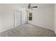 Bedroom featuring a closet, ceiling fan, carpeting, and natural light at 143 Alfani St, Davenport, FL 33896
