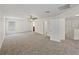 Bonus room with carpet, ceiling fan, and doorways at 143 Alfani St, Davenport, FL 33896
