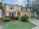 Charming two-story home with a well-manicured lawn and inviting curb appeal at 143 Alfani St, Davenport, FL 33896