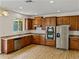 Well-appointed kitchen with stainless steel appliances and ample cabinet space at 143 Alfani St, Davenport, FL 33896