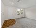Bright, freshly painted living room with new carpet and flooring, bathed in natural light at 143 Alfani St, Davenport, FL 33896