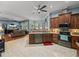 Open kitchen featuring stainless steel appliances and a view into the living area at 148 Melissa Trl, Auburndale, FL 33823