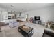 Open floor plan with sightlines from the living room to the kitchen at 1547 Cordgrass Way, Lakeland, FL 33813