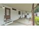Covered carport area with ample parking space, leading to the entrance of the home at 1602 Tally Ho Dr, Lakeland, FL 33810