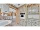 Bright kitchen showcasing the oven and cabinets, with views into other rooms at 1602 Tally Ho Dr, Lakeland, FL 33810
