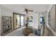 Inviting living room with ample natural light, stylish furnishings, and decorative shelving at 1602 Tally Ho Dr, Lakeland, FL 33810
