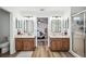Large bathroom featuring double sinks, a shower, and a toilet at 1608 Colonnades N Cir, Lakeland, FL 33811