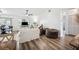 Bright living room with modern flooring, neutral walls, and comfortable seating at 1608 Colonnades N Cir, Lakeland, FL 33811